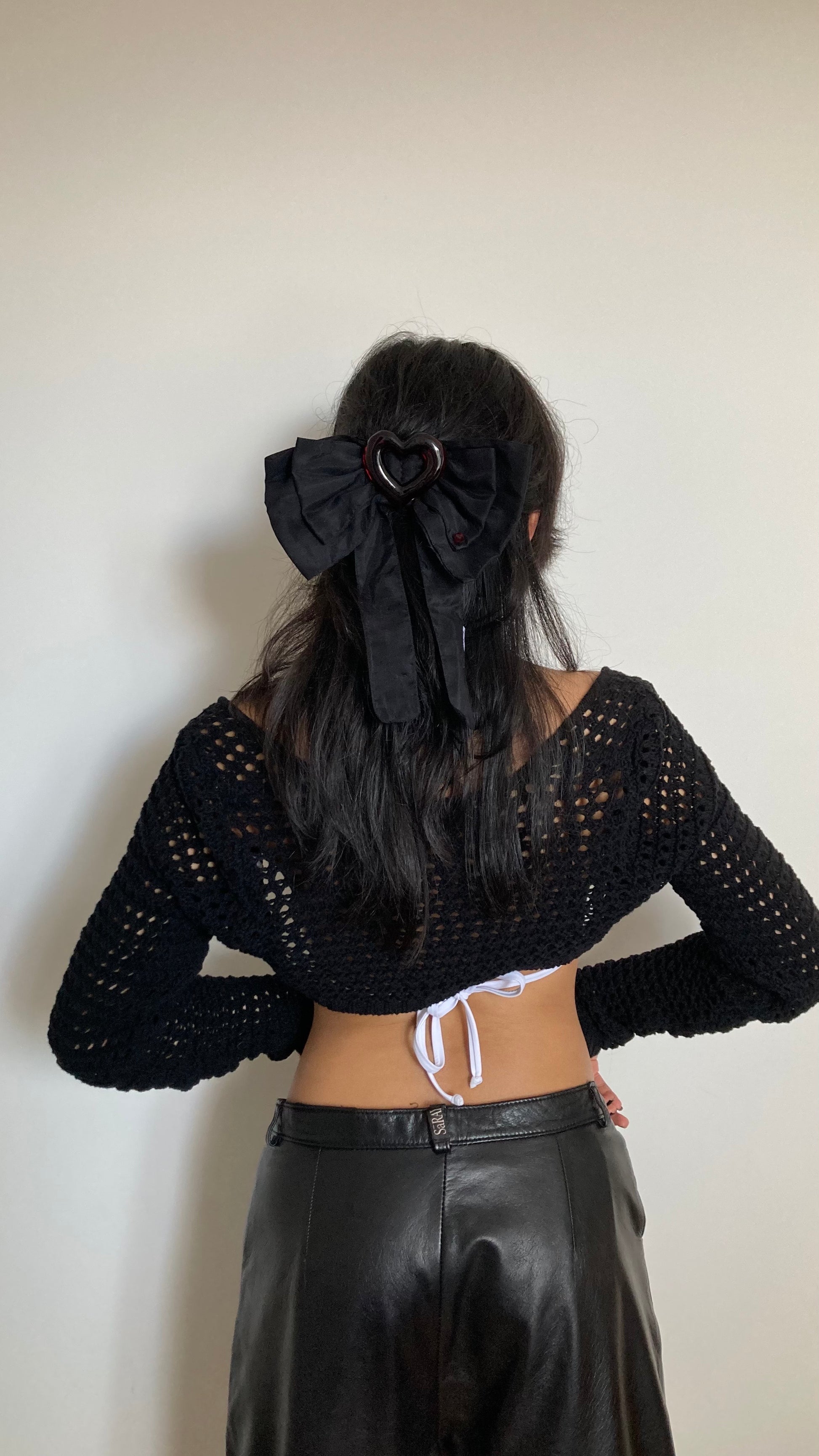 Back of a girl's head with black hair and a black bow clip | Hair Bow | Georgie Hair Bow | Caitlin Snell | Baobei Label