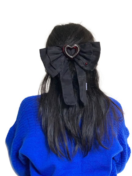 Back of a girl's head with black hair and a black bow clip | Hair Bow | Georgie Hair Bow | Caitlin Snell | Baobei Label